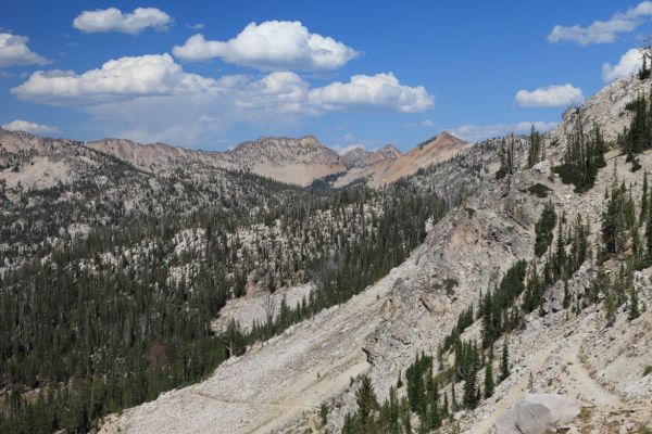 Looking north from the top of the saddle between Ardeth and Spangle lakes to Sand Mountain Pass (center).  The following day, we left the lowest section of the switchback visible in the lower left of photo, and climbed cross country into Ten Lakes Basin to the east.
