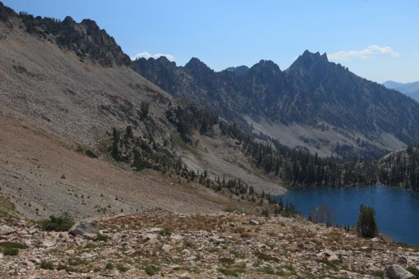 Looking east from the saddle between the lake basin west of Snowyside Peak and lakes 9167' (lower right) and 9050' above Alpine Creek and Alturas Creek Road.  Our route into the Pettit Lake drainage via Twin Lakes lies just left of the two outcrops on the ridge leading down from the upper left corner of the photo.
