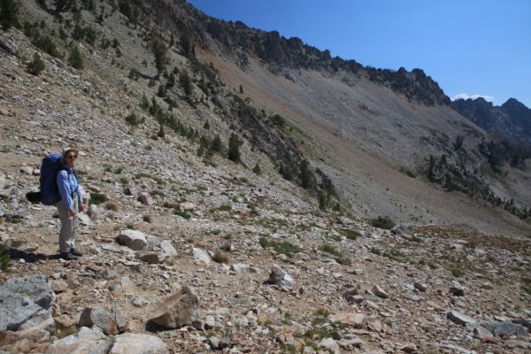 We contoured across the slope to get to the notch leading to Twin Lakes ( just left of the two outcrops on the right end of the ridge, about 3/4 right in photo), but it would have been faster to descend to the lake, then climb back up on stable rock and boulders.
