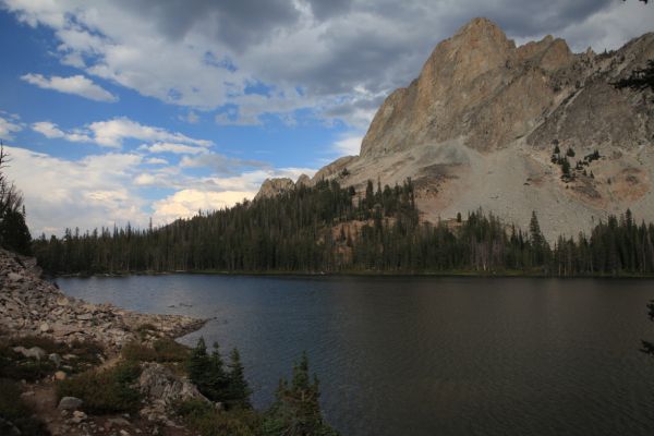 Clouds from a fast approaching thunderstorm loom over El Capitan above Alice Lake, six miles from the trailhead.
