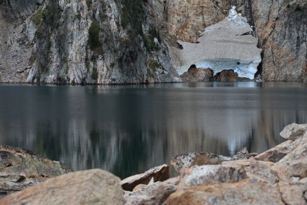 We reach serene Goat Lake about 7 pm.  The snow-filled couloir on the northwest side of the lake looks smaller this year.
