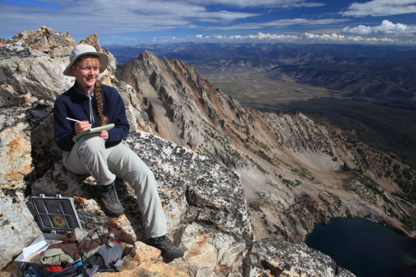 Stanley can be on the valley floor, just above the long east ridge.  The aluminum box containing the summit register was huge!  It reminded me of a geo-cache, as it contained such items as a lighter, and a dime to phone home.
