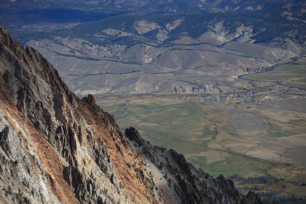 The east ridge of Thompson Peak and the town of Stanley on the Salmon River from the summit of Thompson Peak.  Lower Stanley (downstream) sappears above Stanley in the photo.
