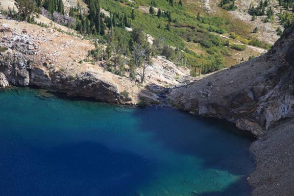 The clear blue waters at the outlet of the 'unnamed lake' below Thompson Peak at roughly 9000'.
