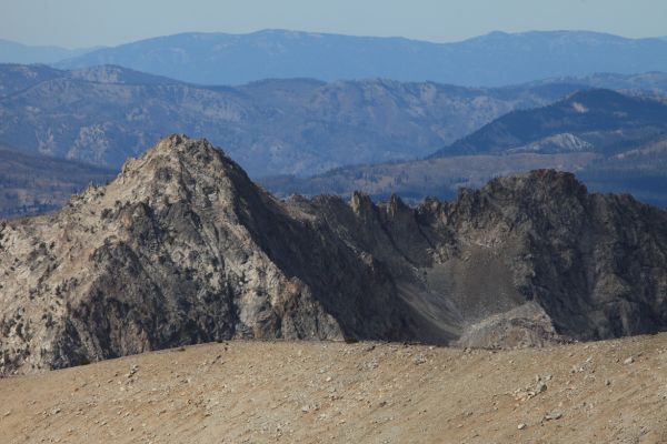 Looking west southwest across Mt. Carter, 10590' (the talus pile in the foreground), toward Peak 10330' from the summit of Thompson Peak.  The North Fork of Baron Creek cut the deeper canyon in the middle of this photo.
