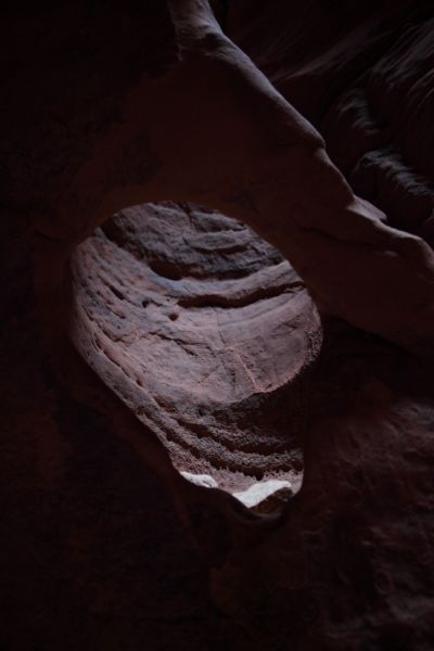 Another hole high on the canyon wall that may have been carved by a boulder circled about by flowing water.
