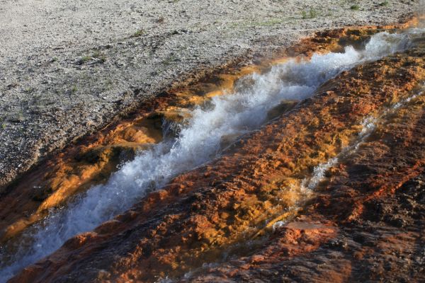 Runoff from the Excelsior Geyser pool into the Firehole River; Midway Geyser Basin.
