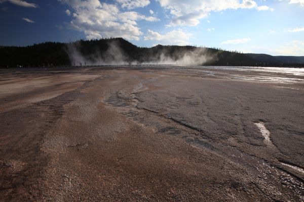 Steam and reflections along the Boardwalk heading west to Grand Prismatic Spring; Midway Geyser Basin.
