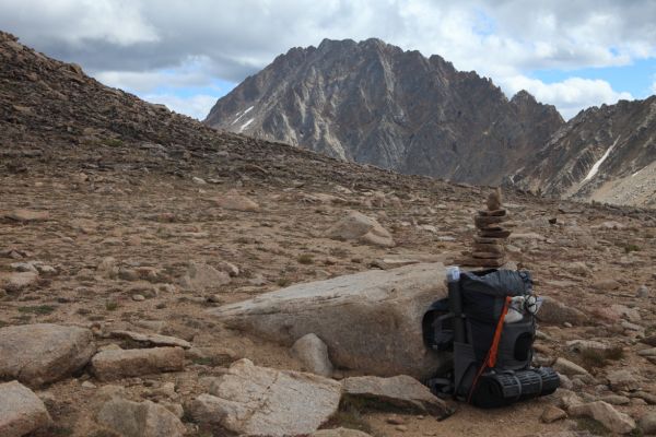 Castle Peak above Four Lakes Basin.  A rather conspicuous cairn puts the minds of those who don't realize they are in the correct saddle at ease.
