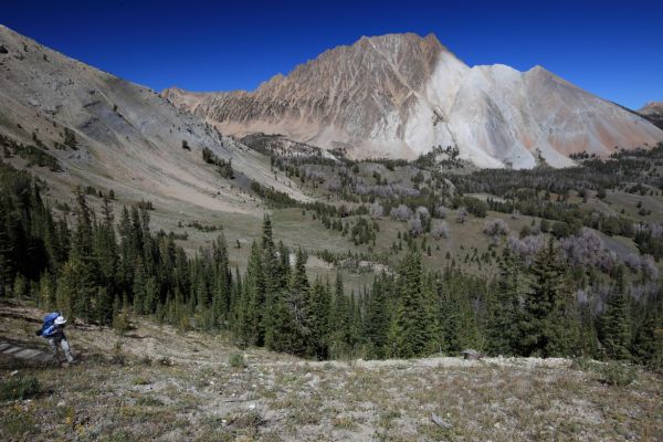 Near the top of the pass (9800') into the Washington Creek Drainage, the ever present Castle Peak rises above tucked away Chamberlain Basin.
