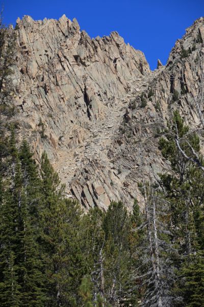 According to Margaret Fuller, "Above the highest lake, a large gray pinnacle on a fractured ridge guards a notch called the Devil's Staircase."
