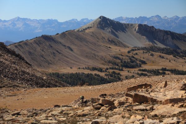 Blackman Peak on the ridge east of Ants Basin from the wide saddle between Born Lakes and Four Lakes Basin.  On the left, the trail to 4th of July Lake is seen switchbacking to the ridgetop.
