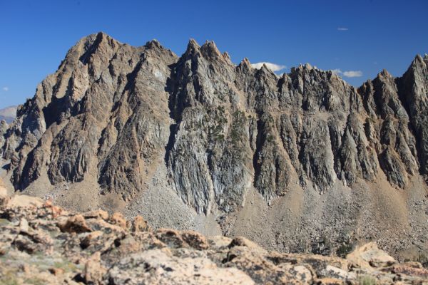 The Serrate Ridge extends to the north from Castle peak, photographed from the wide saddle between Born Lakes and Four Lakes Basin.
