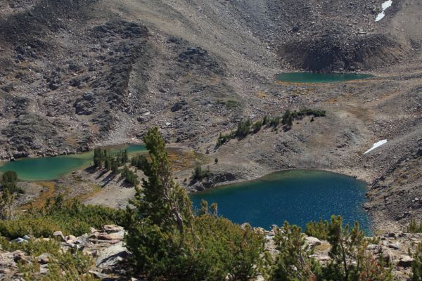 Descending into Four Lakes Basin from the low saddle directly in line with the Born Lakes.
