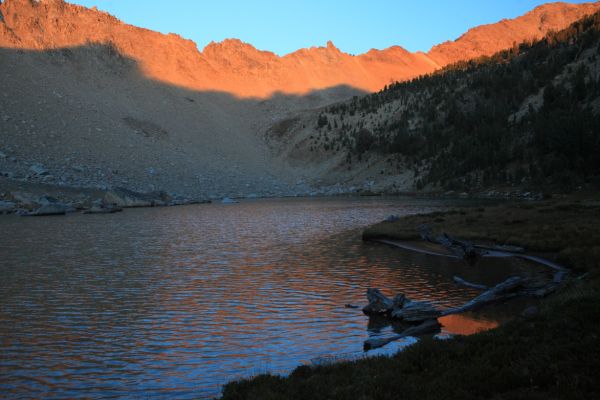 In less than 10 minutes, alpenglow appears on the cirque wall surrounding Shallow Lake.
