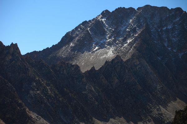 Closer on the north face of Castle Peak with Serrate Ridge in the foreground.
