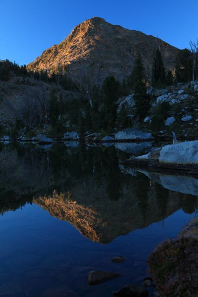 Nice reflections in the still water, but not many fish rings.  I will make the effort, but decide I want to visit the highest lake as I have heard there are some big trout in those waters.
