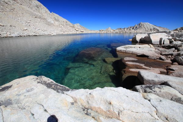 Perhaps I wrongly assumed that because I could not see trout swimming in the amazingly deep, clear water, they simply were not there.  Now I regret not having made a few casts.
