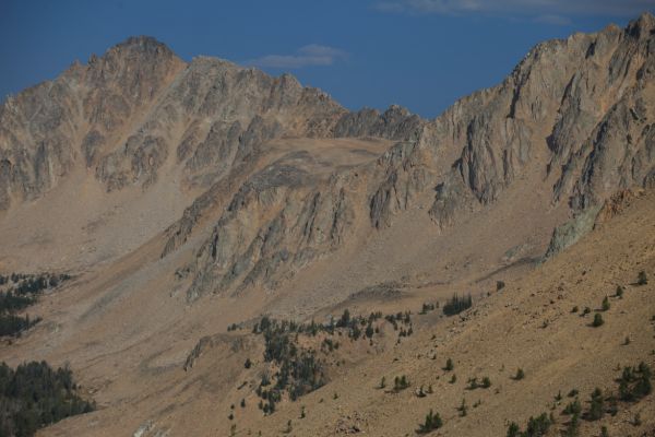 In the upper center, the broad plateau between Born Lakes and Four Lakes Basin as seen from the divide west of Ants Basin.  I hang around waiting for a large shadow to reveal D. O. Lee Peak, but it stubbornly stays put.  The final few miles seem to take forever.  I walk out with food that should have been eaten.
