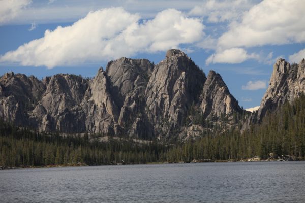 According to Tom Lopez, the "tangled collection of spires, faces, and cliffs at the west end of Ship Island Lake" forms the Litner Group.
