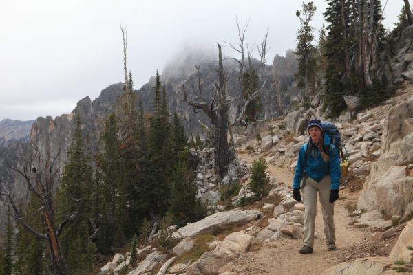 With the weather worsening, we get an early start hiking out.  Knuckle Peak is obscured by clouds.
