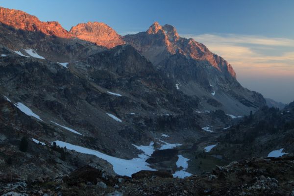 Smoke diffused early morning alpenglow lends an eerie quality to the fantastic views.
