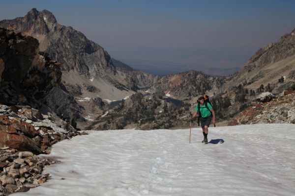 Mike at the entrance to the basin leading to the Thompson Peak/Mickey's Spire saddle.  The couloir drops off steeply beyond.  Our camp lies 1000 vertical feet below, about dead center in the photo.
