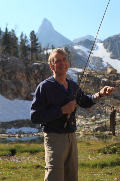 Mike applies the pointers while photographing me holding the 11" Brookie I caught this morning.  Good job!
