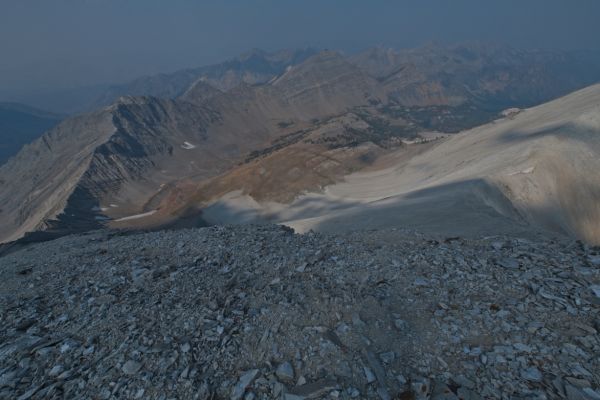 The view northwest into Bighorn Basin from the summit of D. O. Lee Peak.  Peak 10,7777 rises north of Bighorn Basin in the upper center.  Iron Basin lies behind Peak 10,777, and in front of the next ridge to the north.
