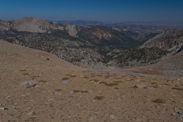 The view north from the low saddle at the top of the steep snow field (I avoided) which drops all the way to the tarn below.
