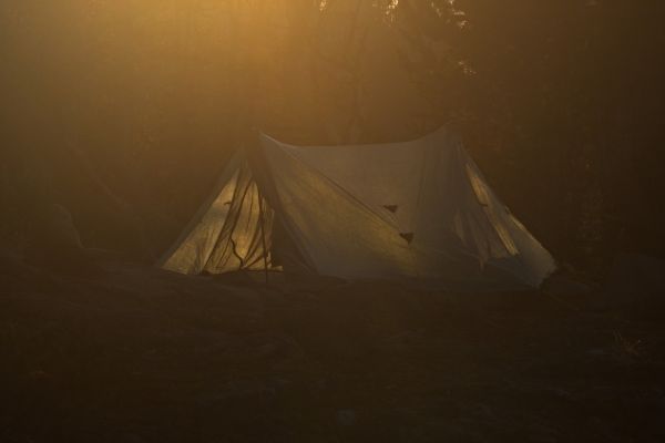 My tent in morning light; Zpacks Duplex 2.  At 2 ¾ lbs, with the stronger spruce fabric option, a ground cloth, stakes, and using trekking poles for support, this is the lightest shelter I have used, easily withstanding the driving hail of last night’s thunderstorm.  Yes, I had trouble trying hurriedly to drive all 8 stakes to the hilt in the cramped space with a thunderstorm bearing down.  Fortunately, there were enough rocks to back up the less secure placements.  The tent made me a fan of trekking poles!
