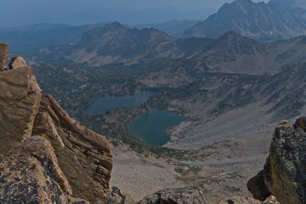 Looking southeast from the saddle between the two Boulder Lake basins to Hidden Lake, draining into Hummock Lake.  Smoke from fires in Oregon and Washington is drifting back to the White Clouds.
