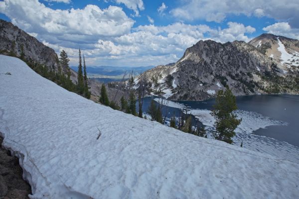 The outflow at the N end of the lake, and scant 4 miles beyond, Iron Creek Trailhead, the approach the masses use to visit Sawtooth Lake.
