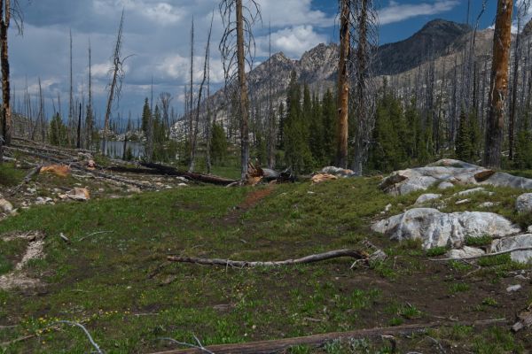 The first of the McGown Lakes appears to the north at 8250 feet.  Note the development of the cumulus over the Stanley Valley.
