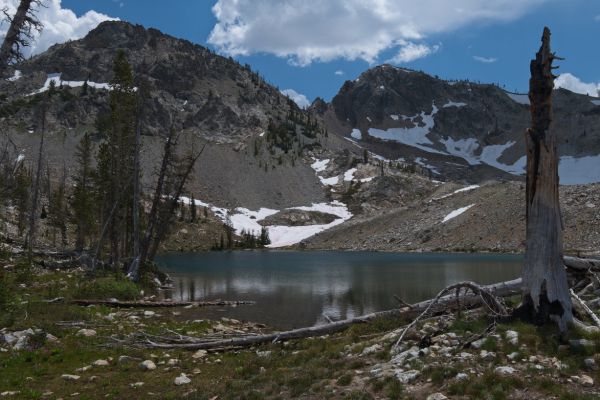 On the south side of the trail, at an elevation of 8505 feet, the highest of the McGown Lakes is about 75 higher in elevation than Sawtooth Lake just over the ridge to the east.  As I recall, it is still a pretty good pull to the pass leading to Sawtooth Lake.
