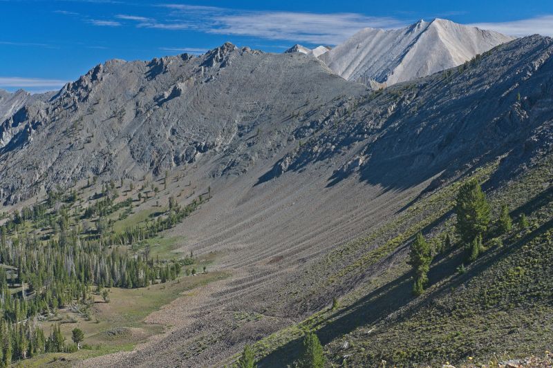 The trail ascends to this point overlooking Strawberry Basin, with the first views of the White Cloud Peaks.
