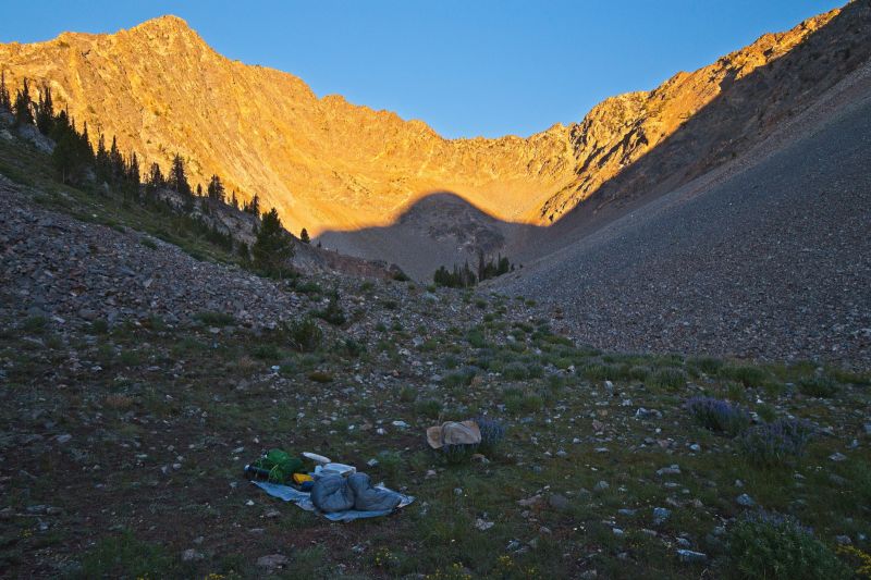 I finally camp at 9200' after failing to find the stream I was looking for.  I should have crossed that stream at about 8700'.  I flows east southeast, in line with the top of Watson Peak and a small lake above Iron Basin to the east southeast, roughly half way through the north/south climb into the basin proper.  I dropped my pack and checked for water at the high tarn below the east face of Watson, but it was dry.
