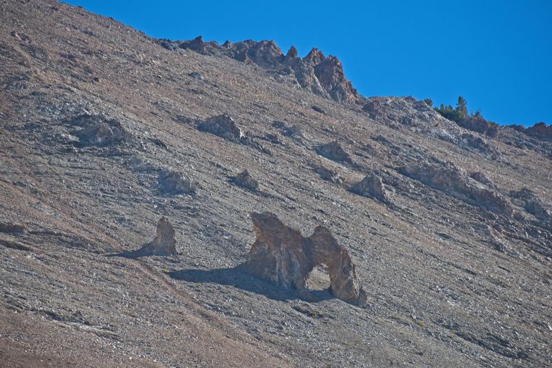 Closer view of the natural arch on the steep north side of Iron Basin proper.
