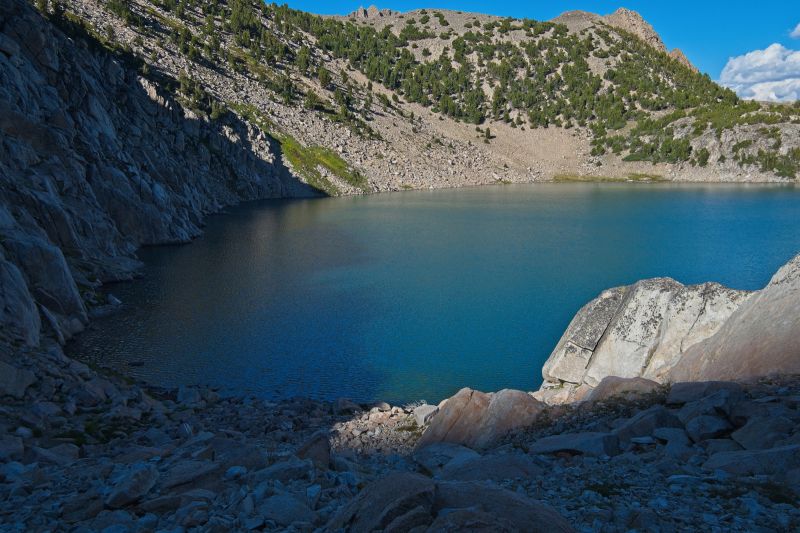 The inlet is very deep, especially below the sunlit boulders on the right.  I saw several large trout just off that rock on the inlet side.  I noted the time, hoping to return the next day.  Afternoon thundershowers put an end to those hopes.
