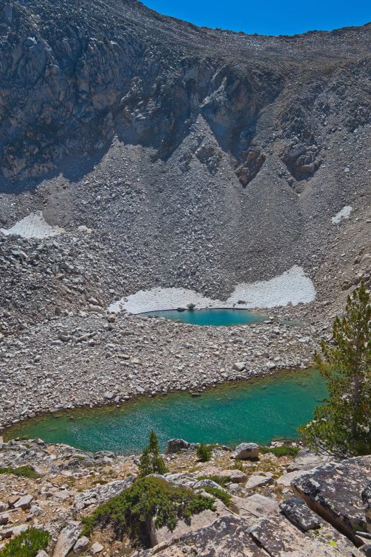 The two highest tarns come into view from the ridge just to the north.  I'm headed for that low gap on the skyline.
