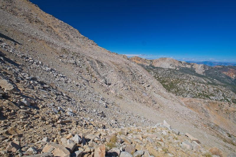 After reaching the lower saddle, I took this shot (north) to document the route I took from the ridge below.  As one can see, it is best to traverse up and around, utilizing the most stable rocks.
