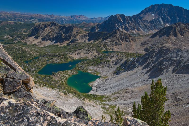 Looking down at Hummock Lake from the top of the "Cheese Grater".  There are several chutes that can be downclimbed from this ridge.  The route I chose started was easy, but became rather steep class three for a short section below.  A large pine provided some welcome holds.  The solid rock is preferable to the steep, sandy goat paths.
