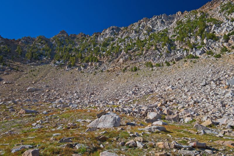 Arriving in the basin, I stop to photograph what I just down climbed.  Can't say exactly where I crossed-- probably on the skyline just right (east) of the center of frame.  This is not something one should be doing without some climbing experience.  The ability to recognize what 'goes' safely is crucial.
