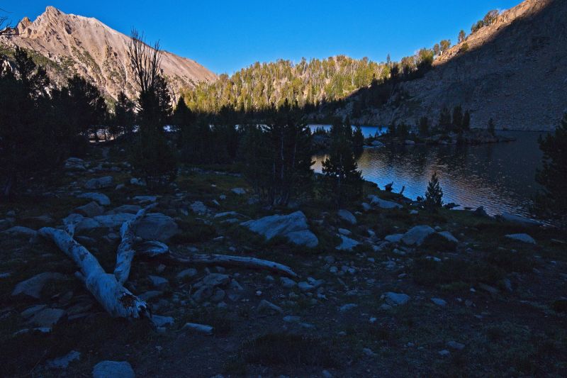 By the time I get to Scoop Lake, get the tent up, set the food hand, and pump water, the sun has dropped below the headwall that forms the west side of the basin.  I spent too much time talking with a group camped at the other end of the lake, and won't get to fish this evening.  That isthmus that reaches almost across the lake is a nice spot to fish.
