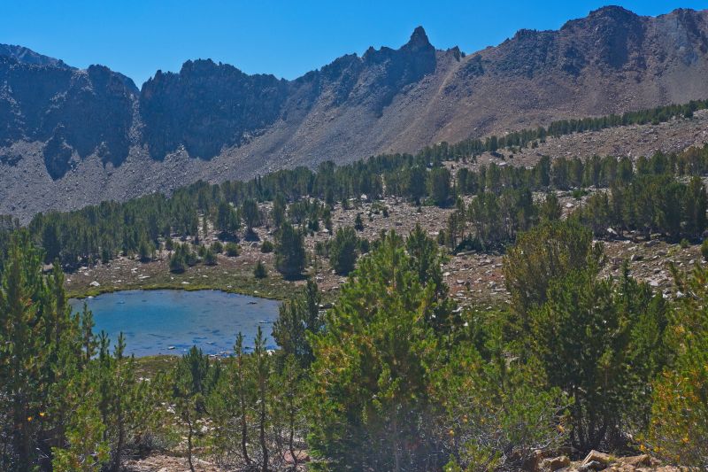 The tarn, just below Windy Devil, the pass that leads to Boulder Chain Lakes Basin on the east.  Straight ahead, the cross-country route leading to the "Devil's Staircase".  Must the Devil have all the good passes?
