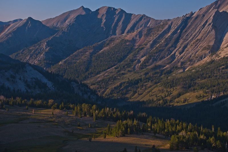 I reach the top of the ridge above Ants Basin before 7:15 pm.  I change to the telephoto and have a well-deserved snack while taking photos in the fading light.  The entrance to Iron Basin is on the left edge of the frame.  Watson Peak on the west side of Iron Basin is the highest peak visible in this shot.
