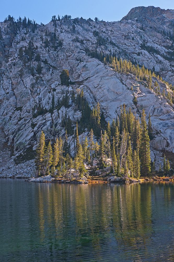 A peninsula on the west shore of Imogene catches the last rays of daylight, while the slope above and west is already in shadow.  I meant to take a photo of the rainbow trout I caught, but it was getting late, and I did not want to be cooking in the dark, which, of course, is what happened!
