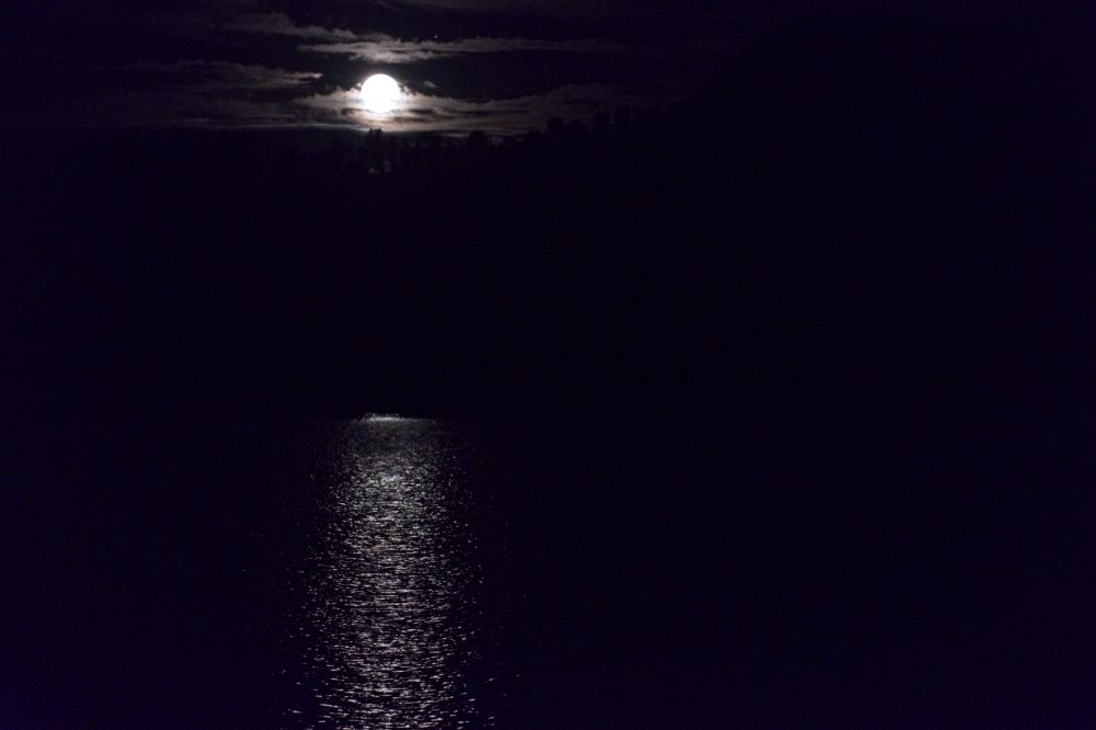 9:50 pm when the moon finally rises above the peaks due S from the inlet at Cove Lake.  78 mm, the wide end of the telephoto.  The lens has optical stabilization, but I still used one one-hundredth of a second, and was able to utilize a reasonably low ISO of 1600.  The Fujifilm XT-2 lacks the low light capability of my Canon 5D II, but it is so much lighter!  This has been a long day.  I'm looking forward to a good night's rest, and a layover day  in the Big Boulder Lakes basin.
