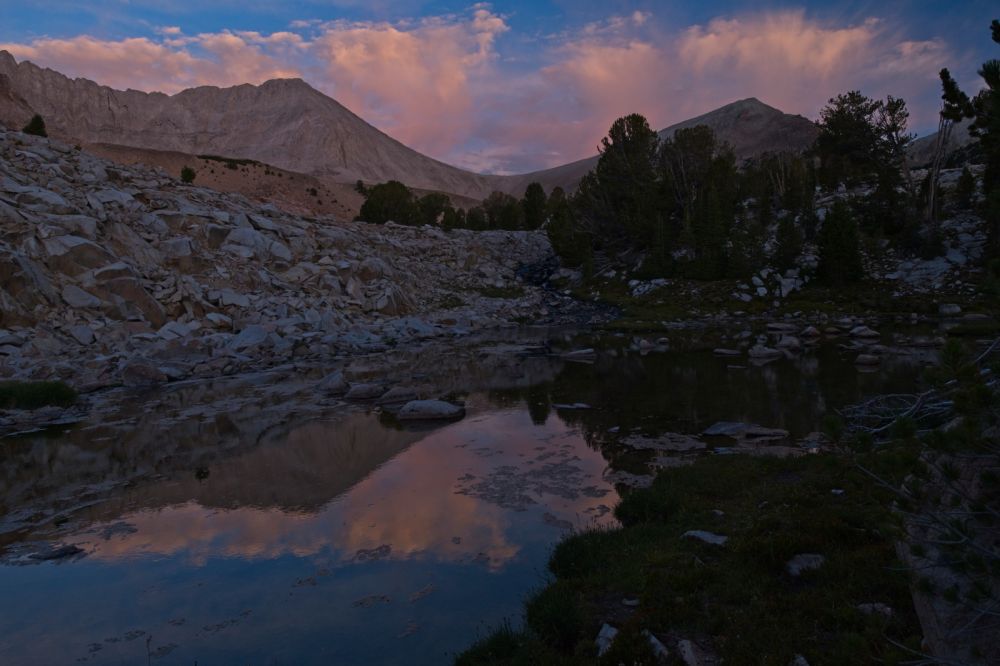 Last alpenglow; the saddle between D. O. Lee Peak and WCP-9; 15 mm.  Just a minute ago the alpenglow was more intense, but cloud cover in the east has greatly reduced the affect.  One more chance at this tomorrow morning!  Much like last night, a veil of clouds has softened the light.
