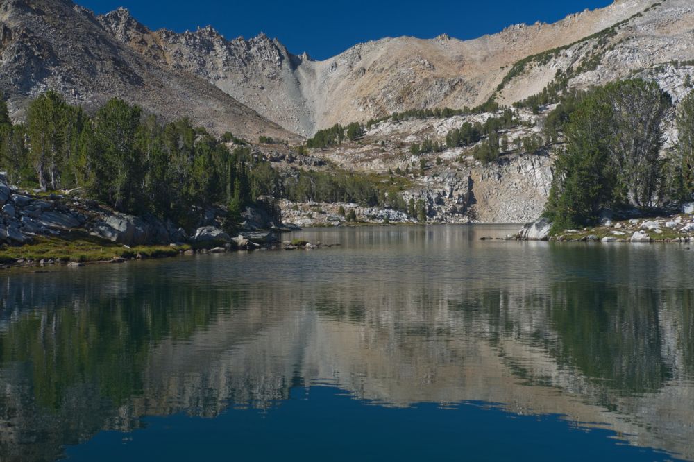 Looking SW from the NE end of Cove Lake.  I took this photo to remind myself that I have to walk N around the entire lake.  I made the right choice, as there is no way across the mouth of this cove other than swimming.  Today I plan to cross from Big Boulder Lakes SE to the Boulder Chain Lakes.  Not the earliest start, but I will still have plenty of time to reach my objective, Scoop Lake.
